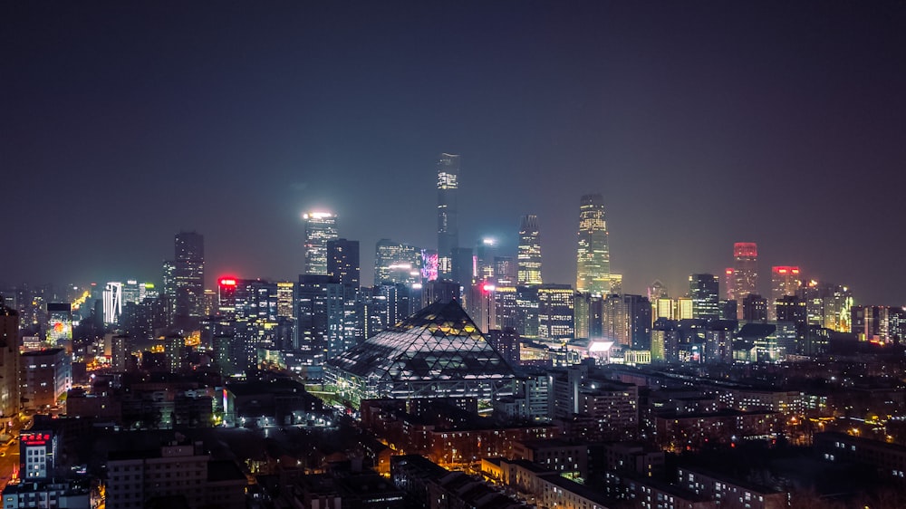 city skyline during night time