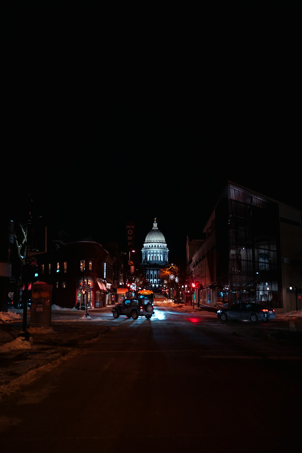 people walking on street during night time