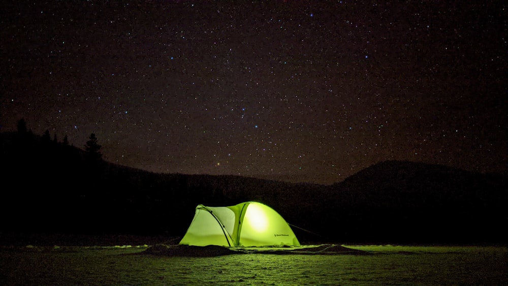 green tent under starry night
