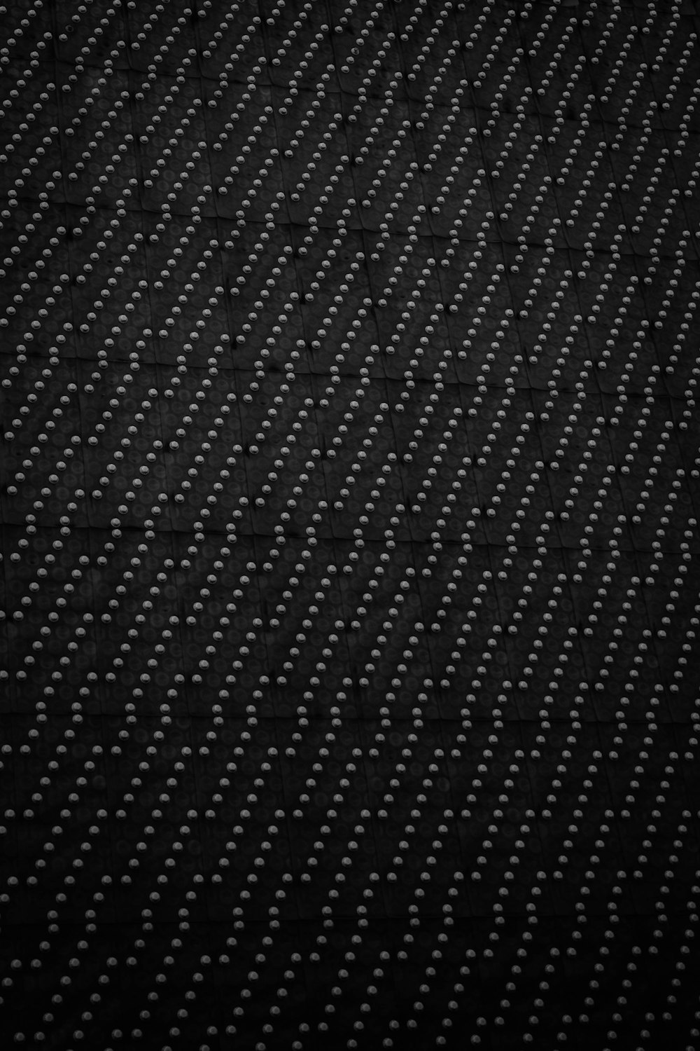 black and white polka dot textile