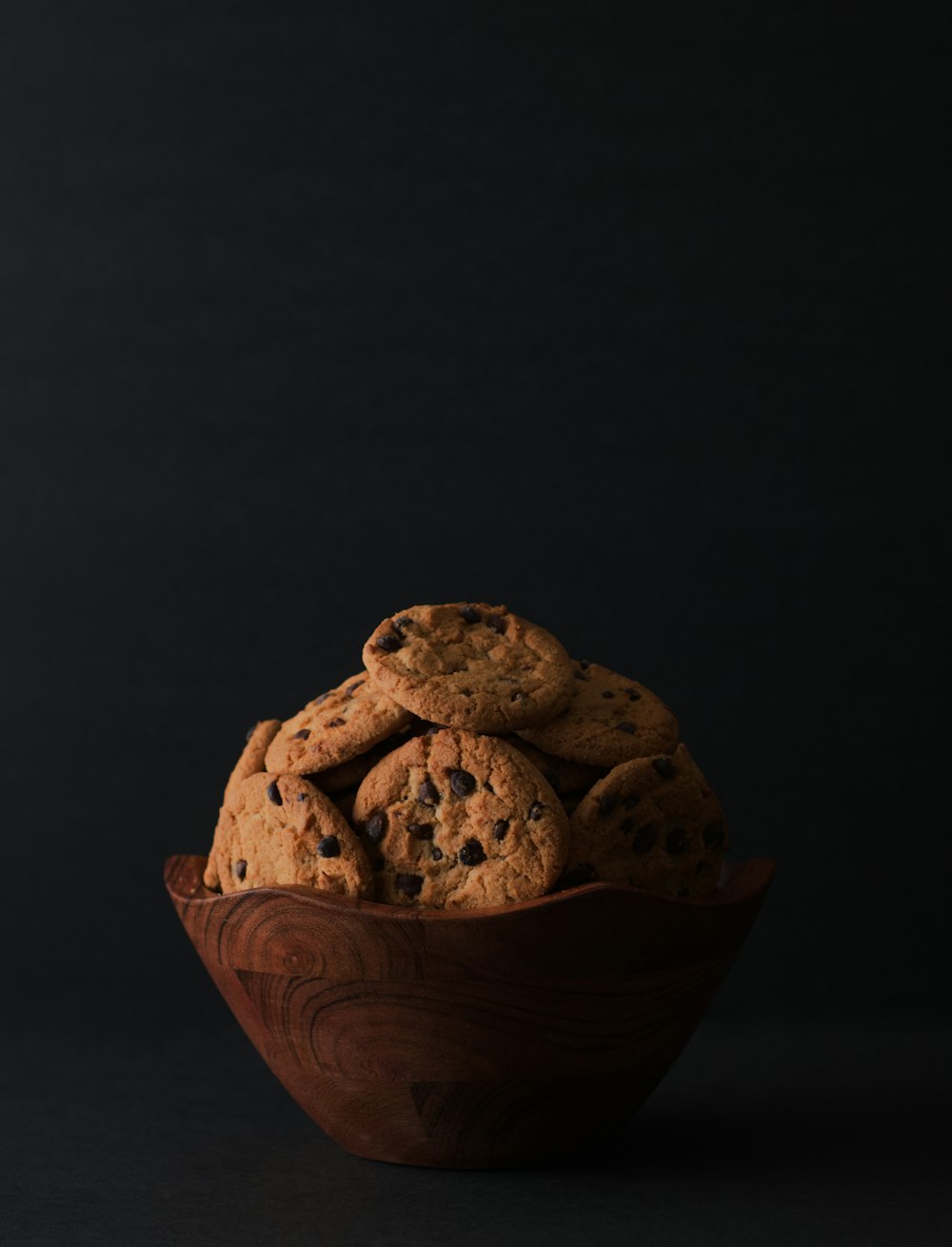brown cookies in brown wooden bowl