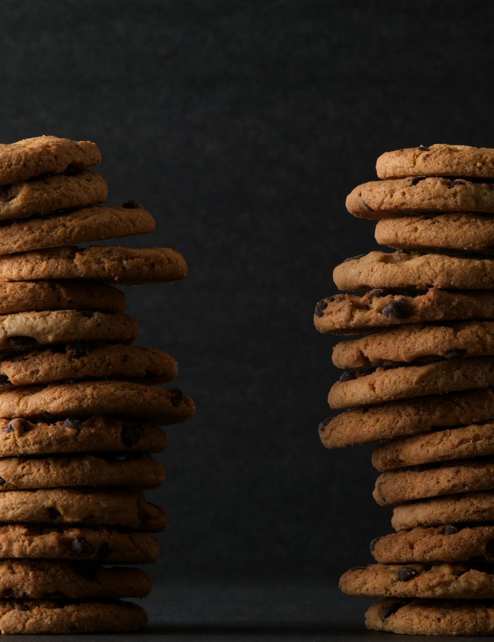 brown cookies on black surface