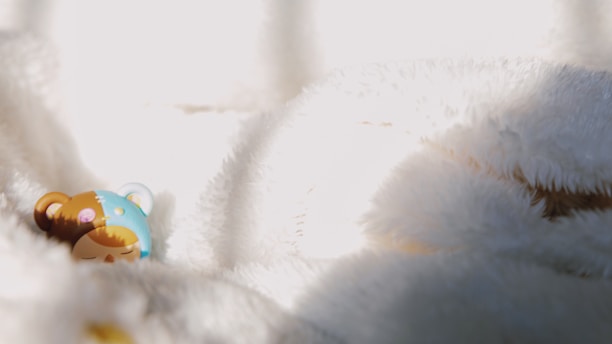 A cozy scene featuring Biscuit the bear plush toy sitting on a soft cream background with peach accents and subtle puzzle piece borders.