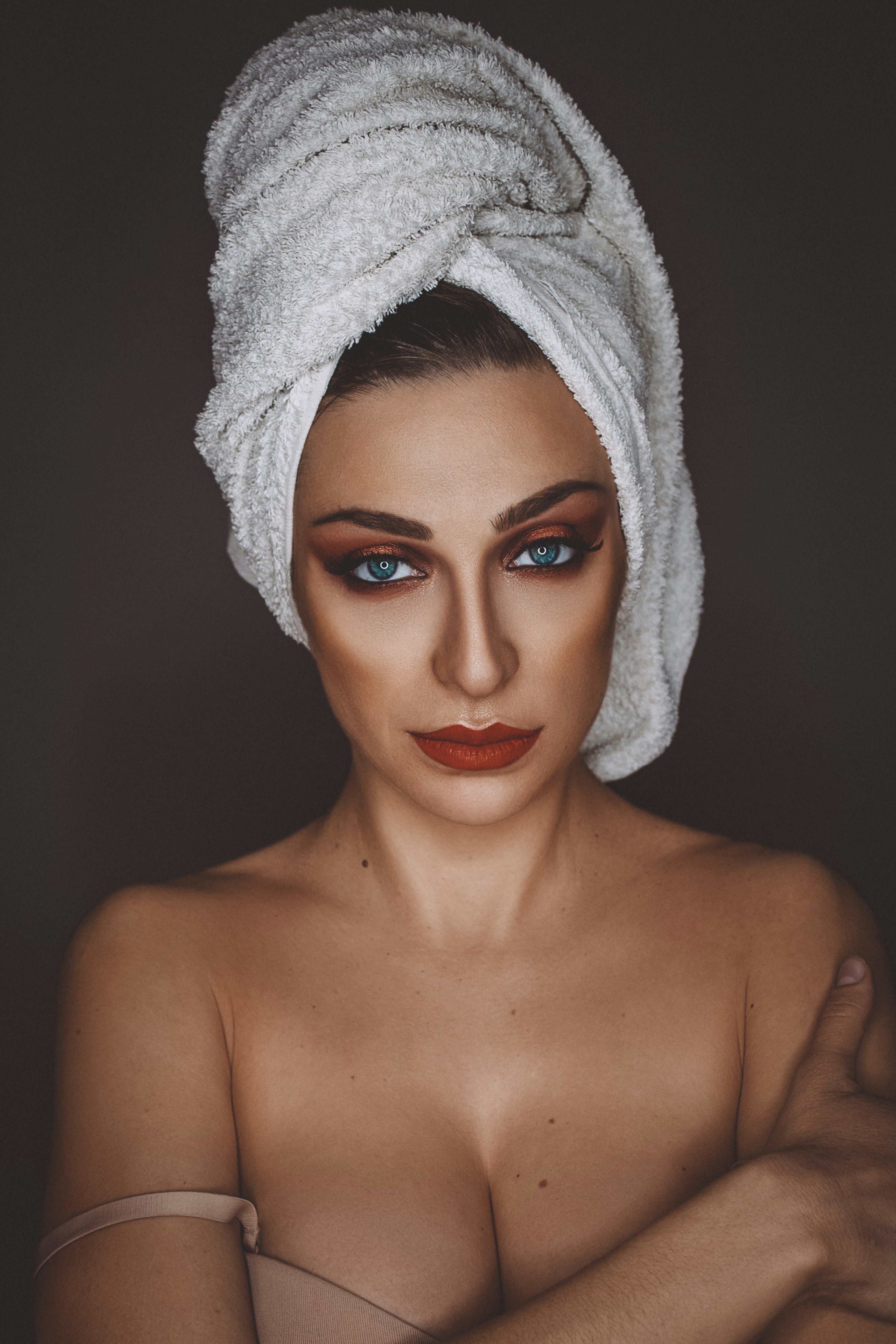 woman with white towel on head