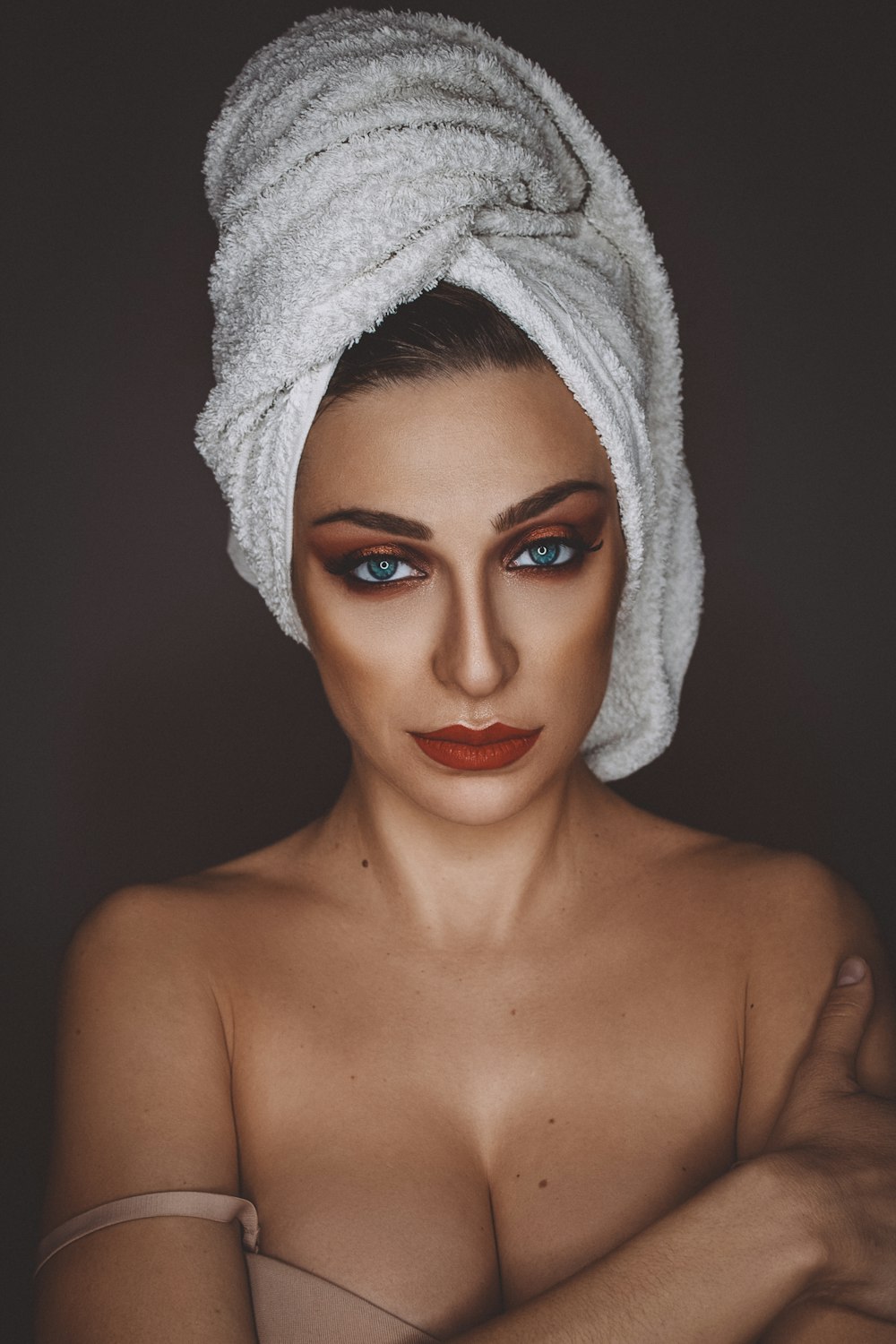 woman with white towel on head