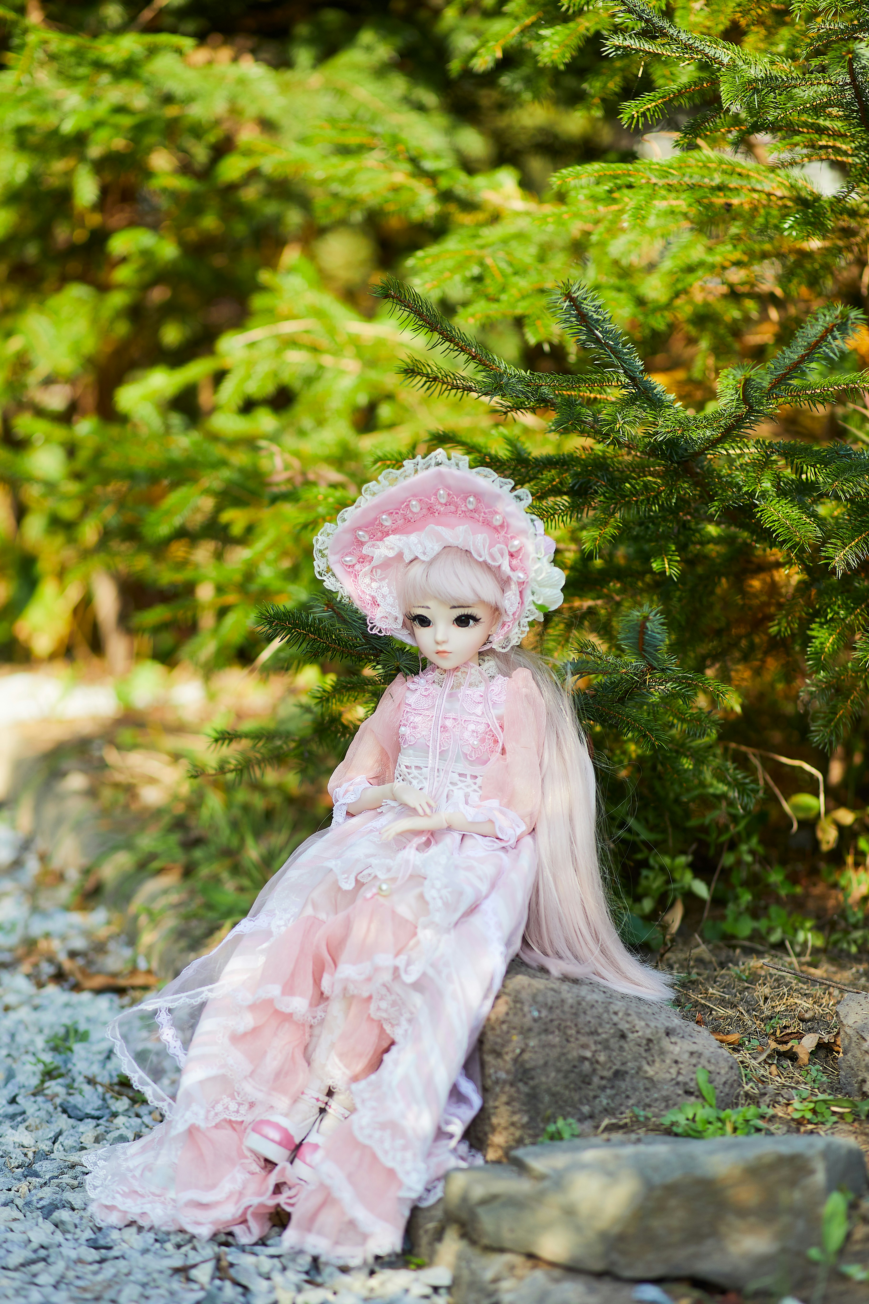 girl in white dress with pink flower headband