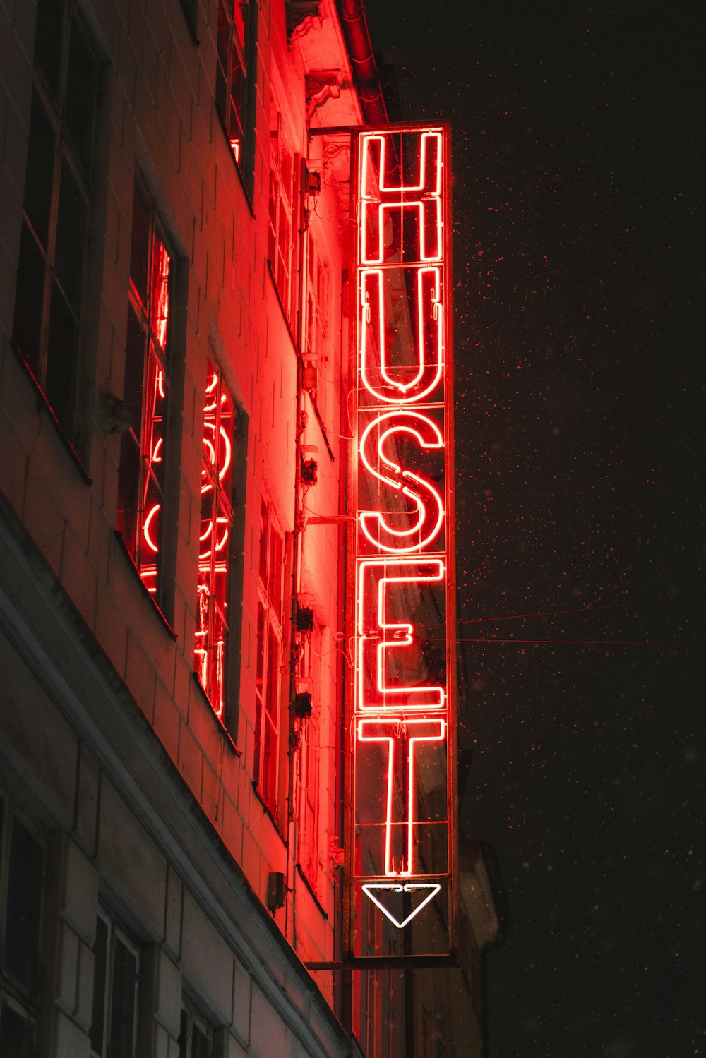 red and white neon light signage