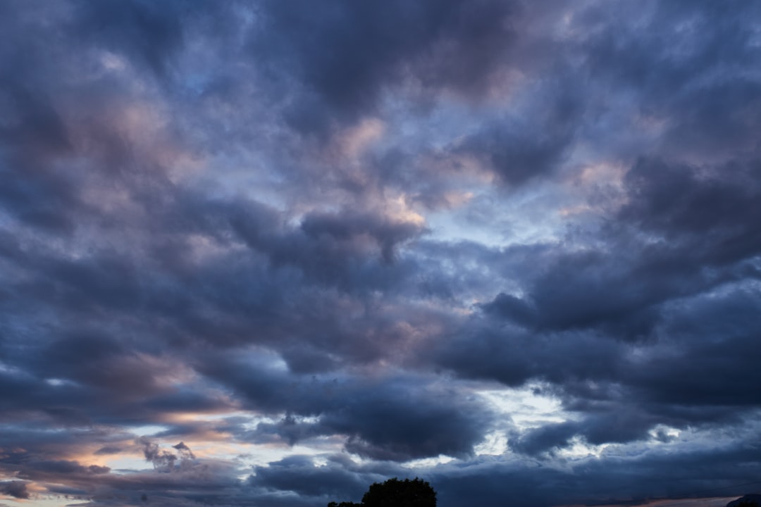 black clouds and blue sky