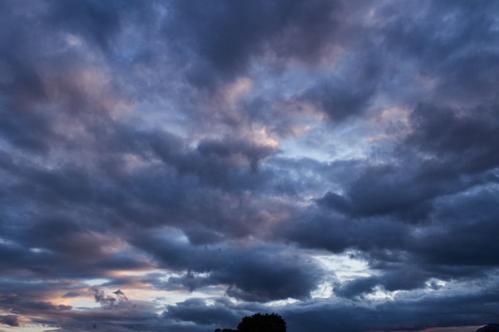 black clouds and blue sky