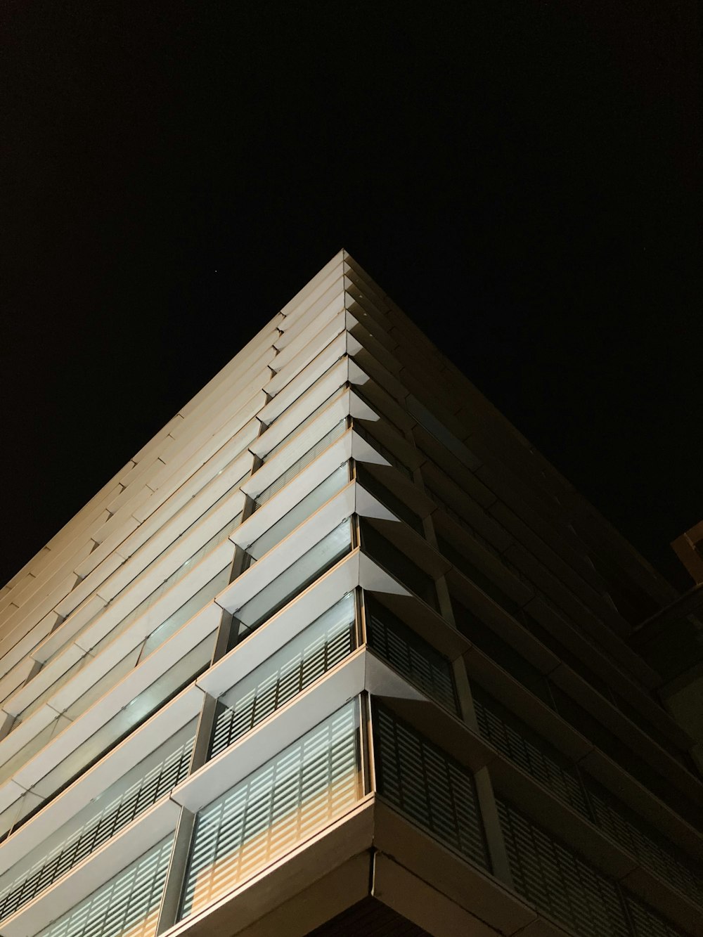 white concrete building during night time