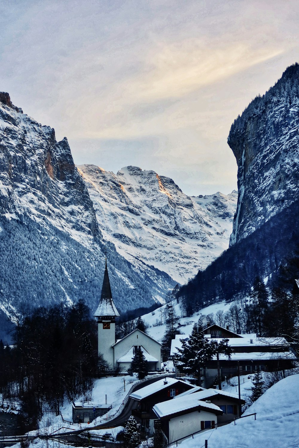 white and gray house near mountain