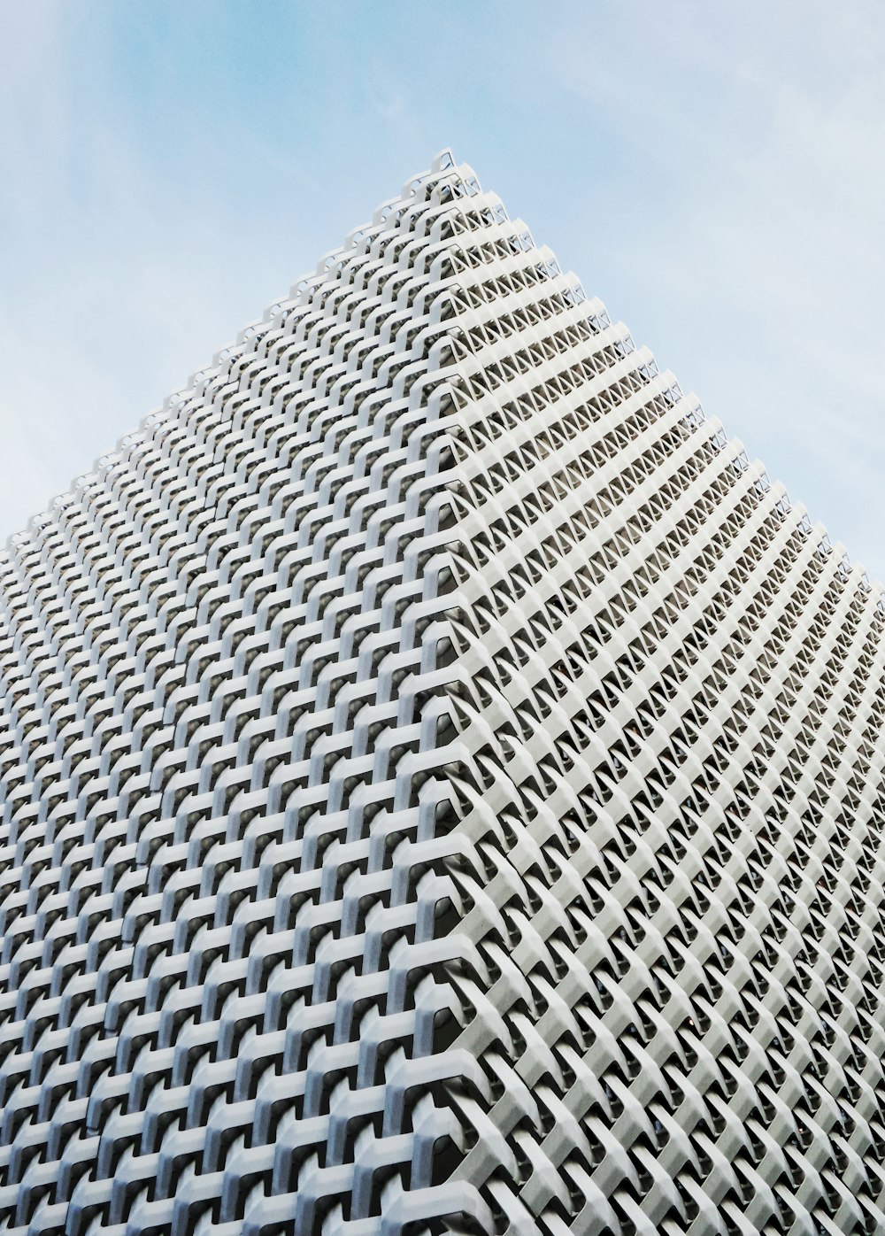 white and black concrete building under blue sky during daytime