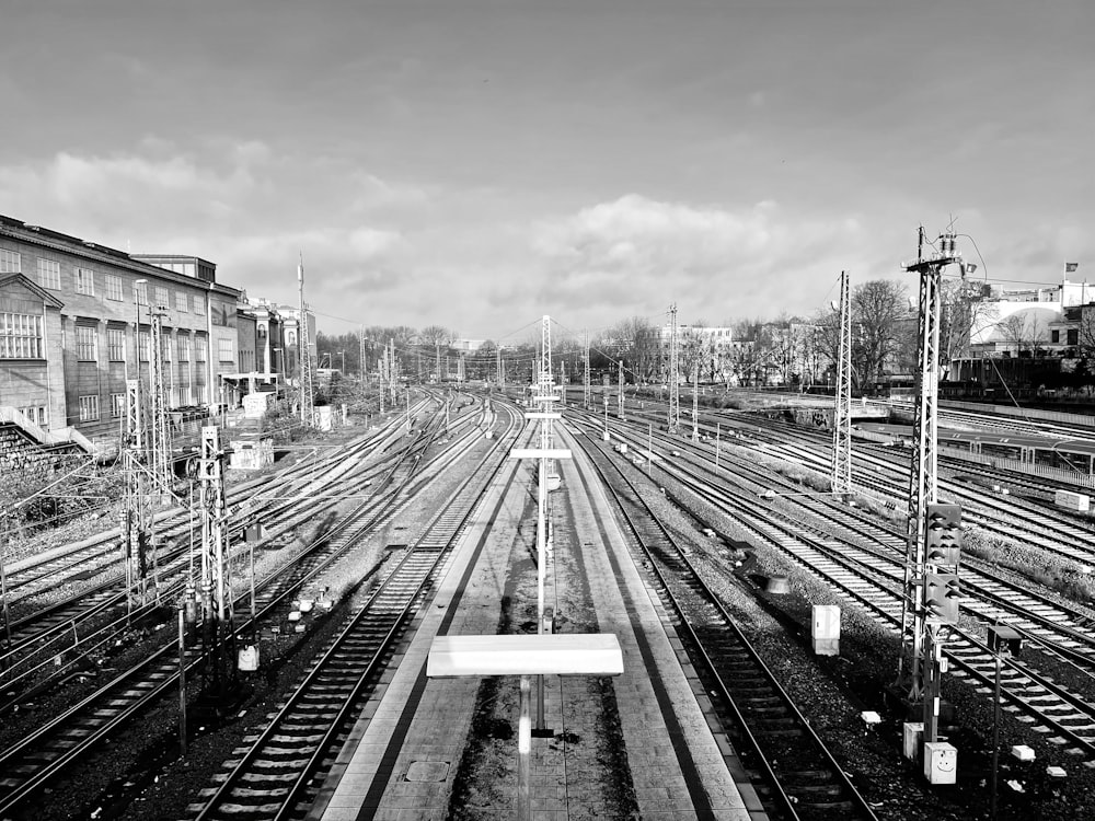 grayscale photo of train rail