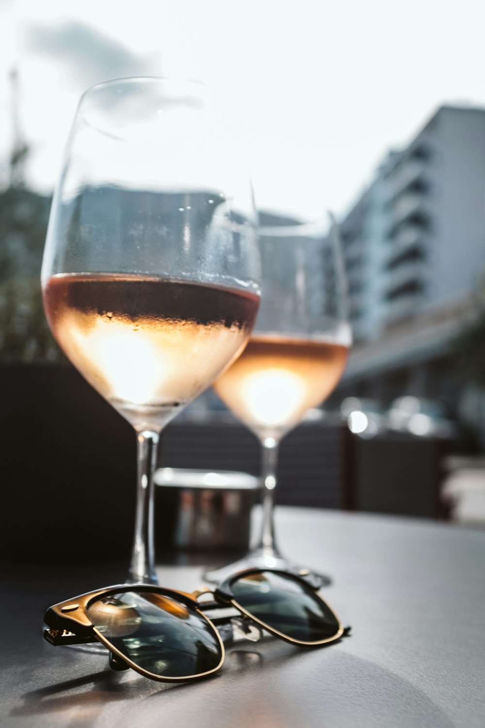 clear wine glass with brown liquid