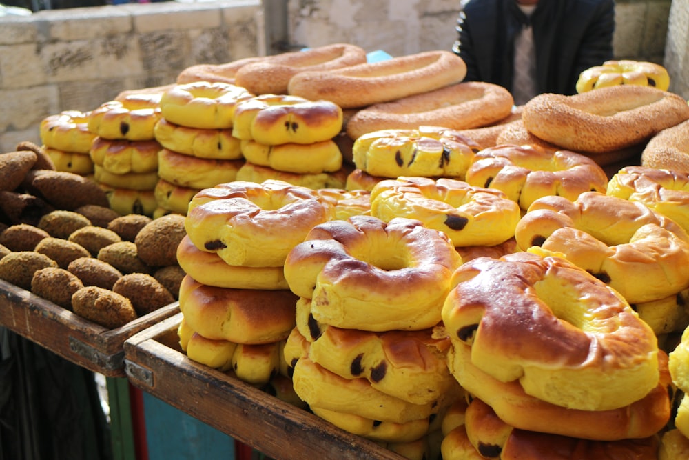 brown doughnuts on stainless steel tray