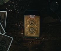 black and yellow box on brown wooden table