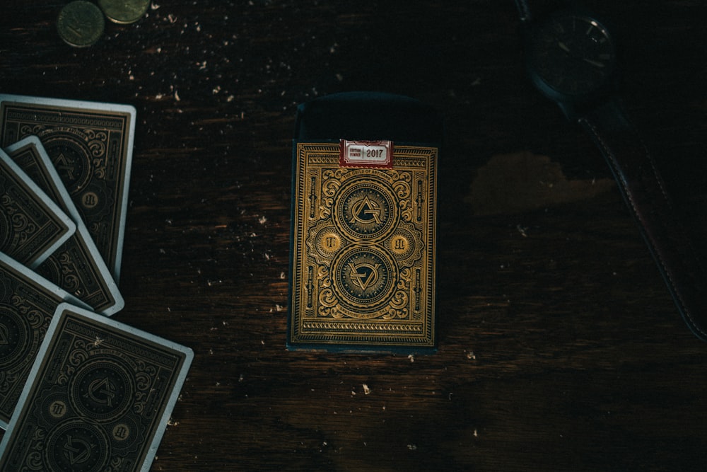 black and yellow box on brown wooden table