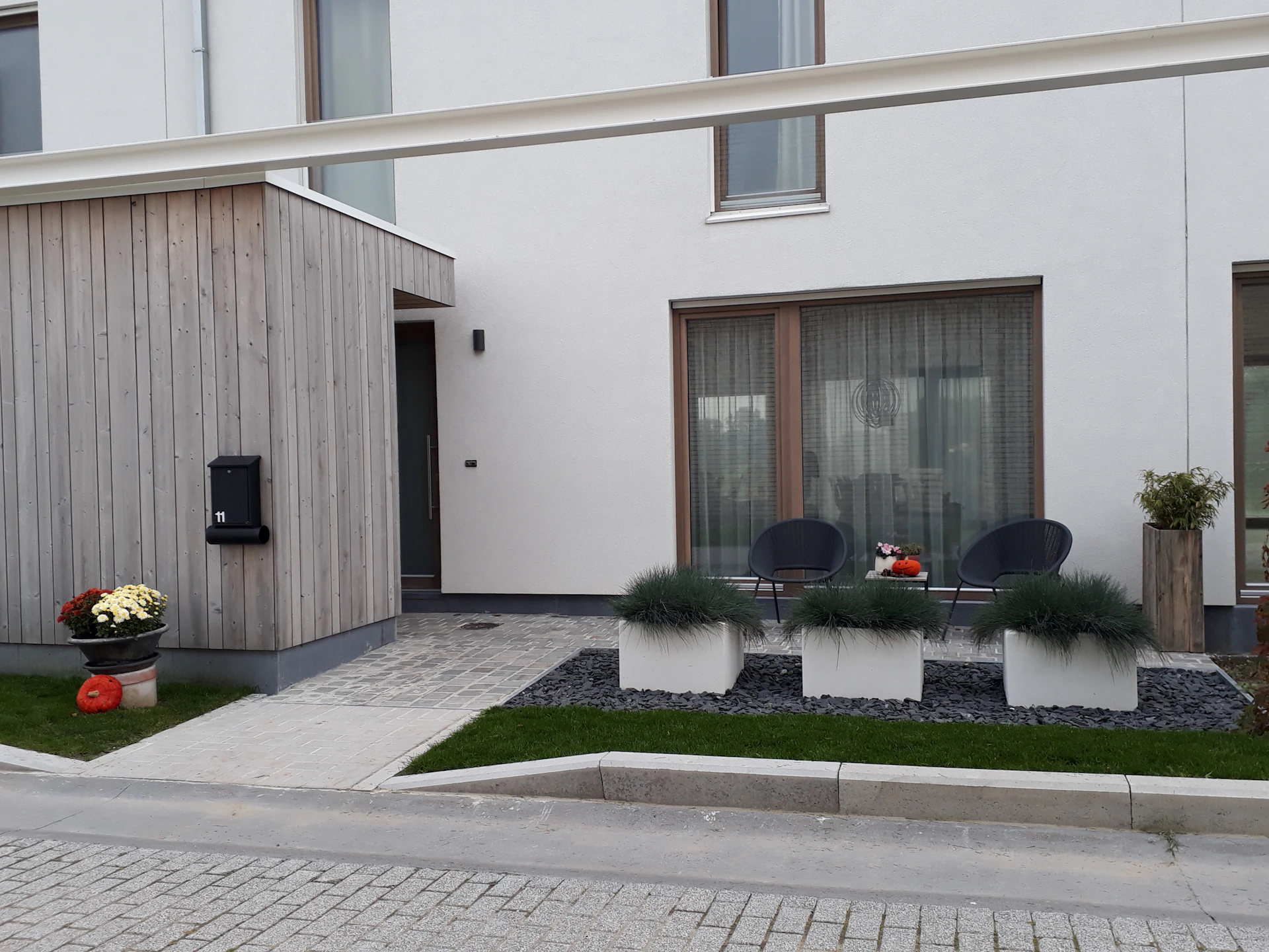 woman wearing yellow long-sleeved dress under white clouds and blue sky during daytime