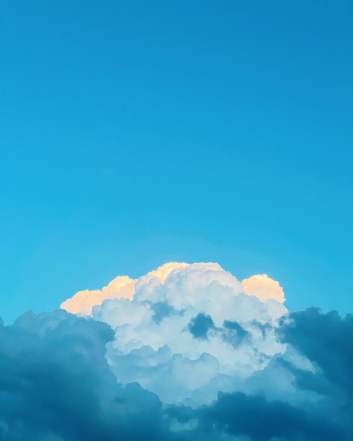 White clouds in a blue sky during daytime