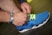 blue and white nike athletic shoe