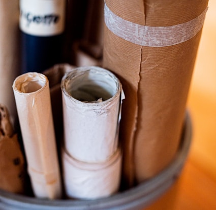 white and brown rolled paper