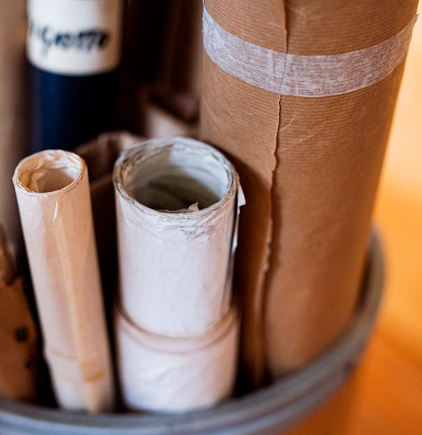 white and brown rolled paper