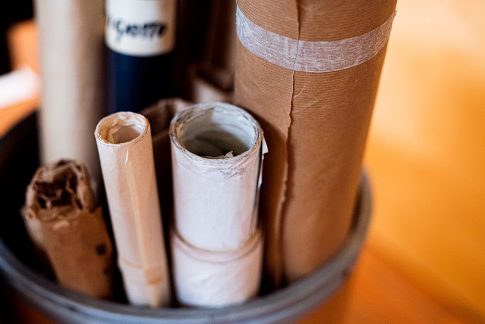 white and brown rolled paper