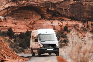 gray volkswagen golf on brown dirt road during daytime