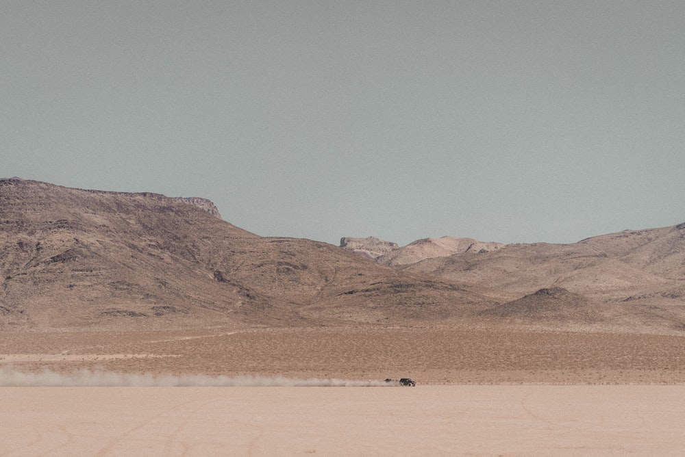 people walking on desert during daytime