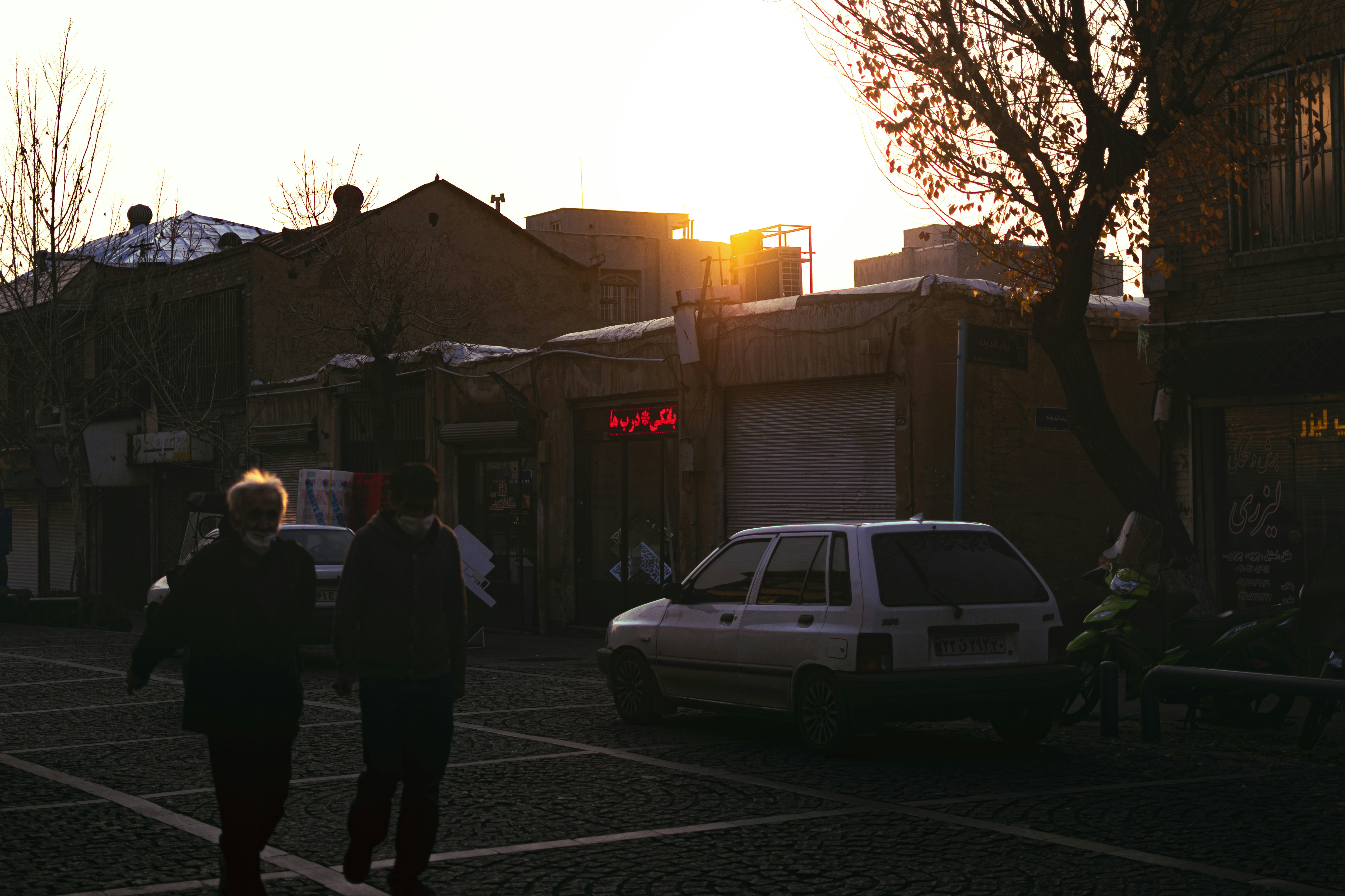 people walking on sidewalk during daytime