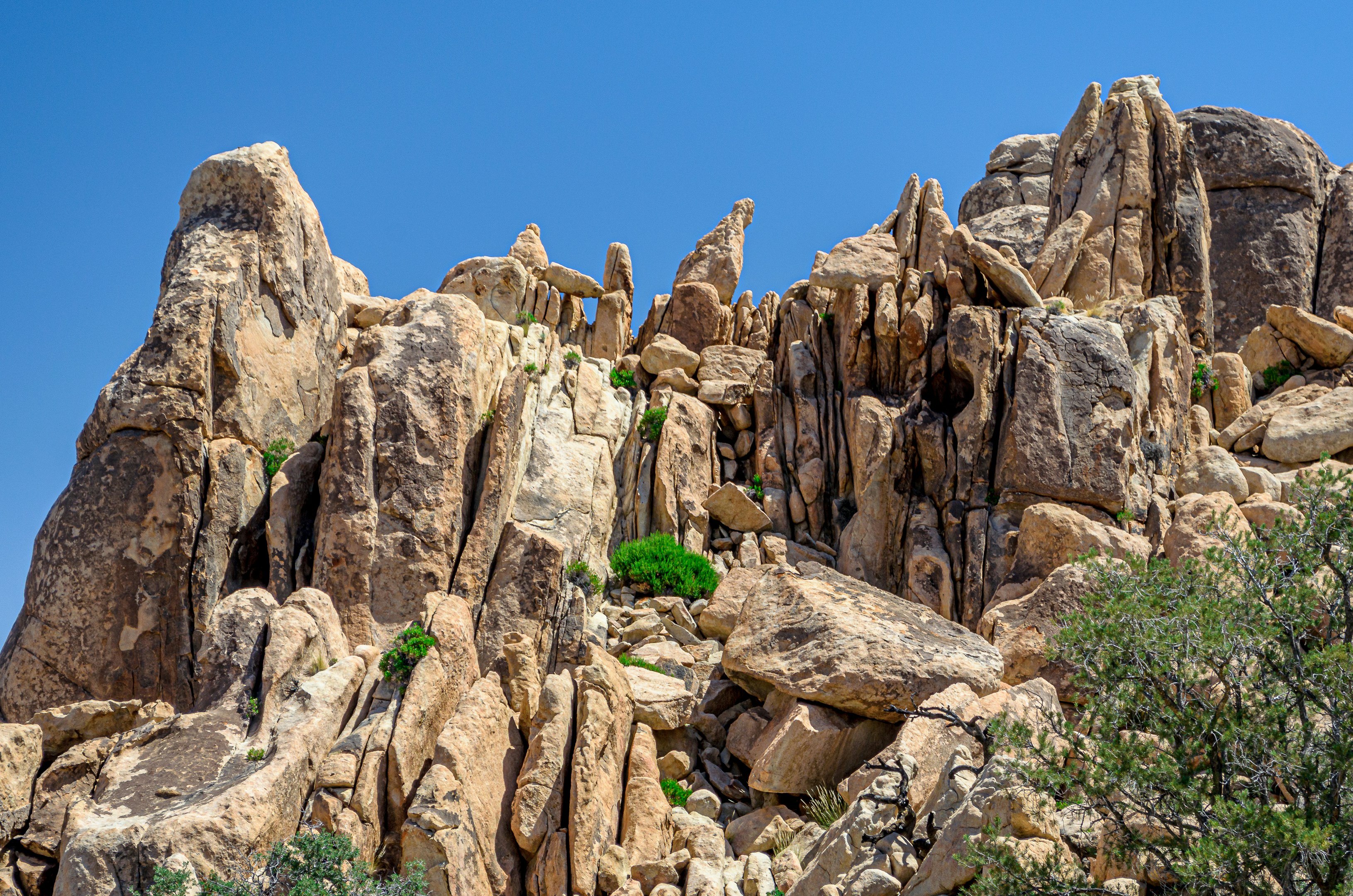 brown rock formation under blue sky during daytime