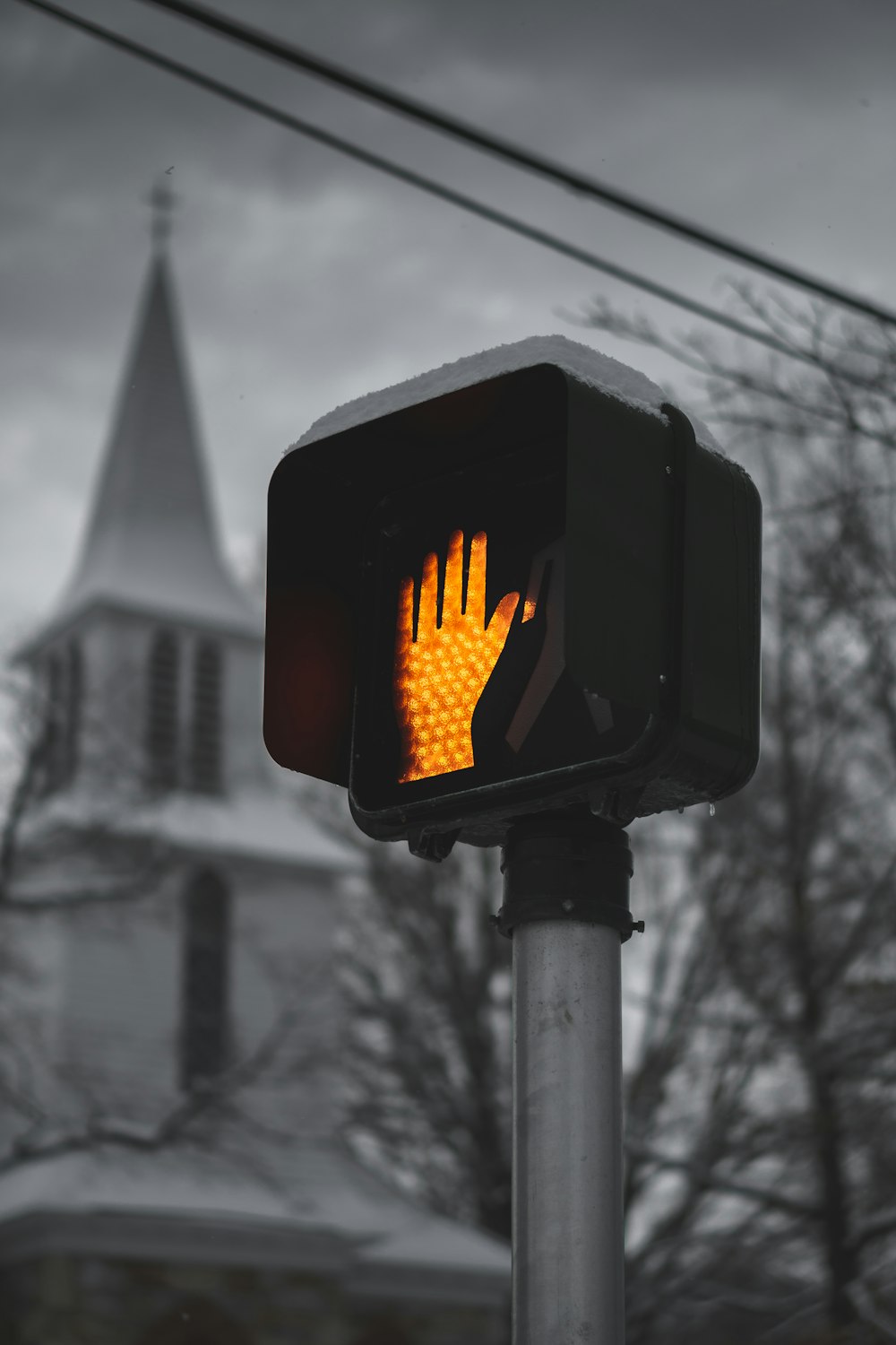 black traffic light with red light