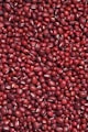 red round fruits on white surface