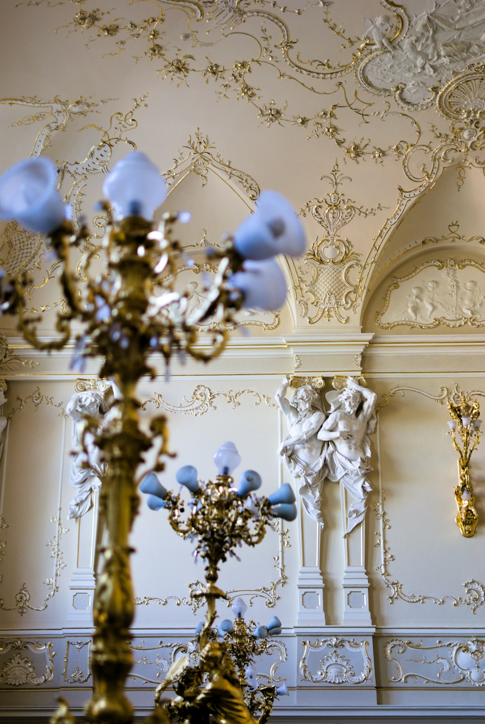 gold and blue floral uplight chandelier