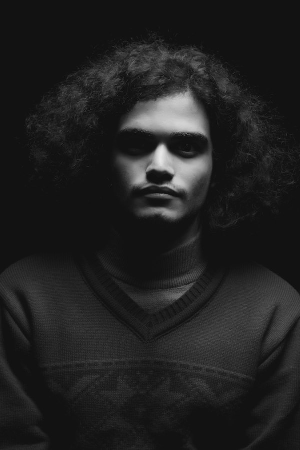 Man with tousled wavy hair