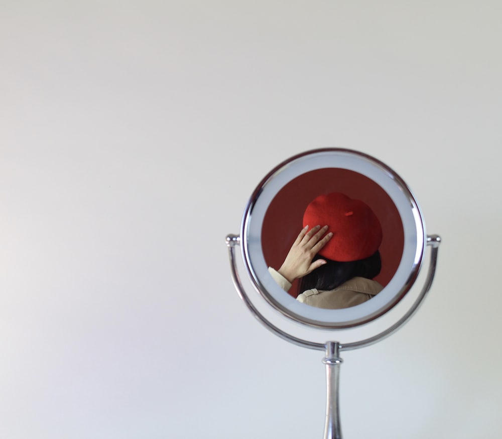red and white round mirror