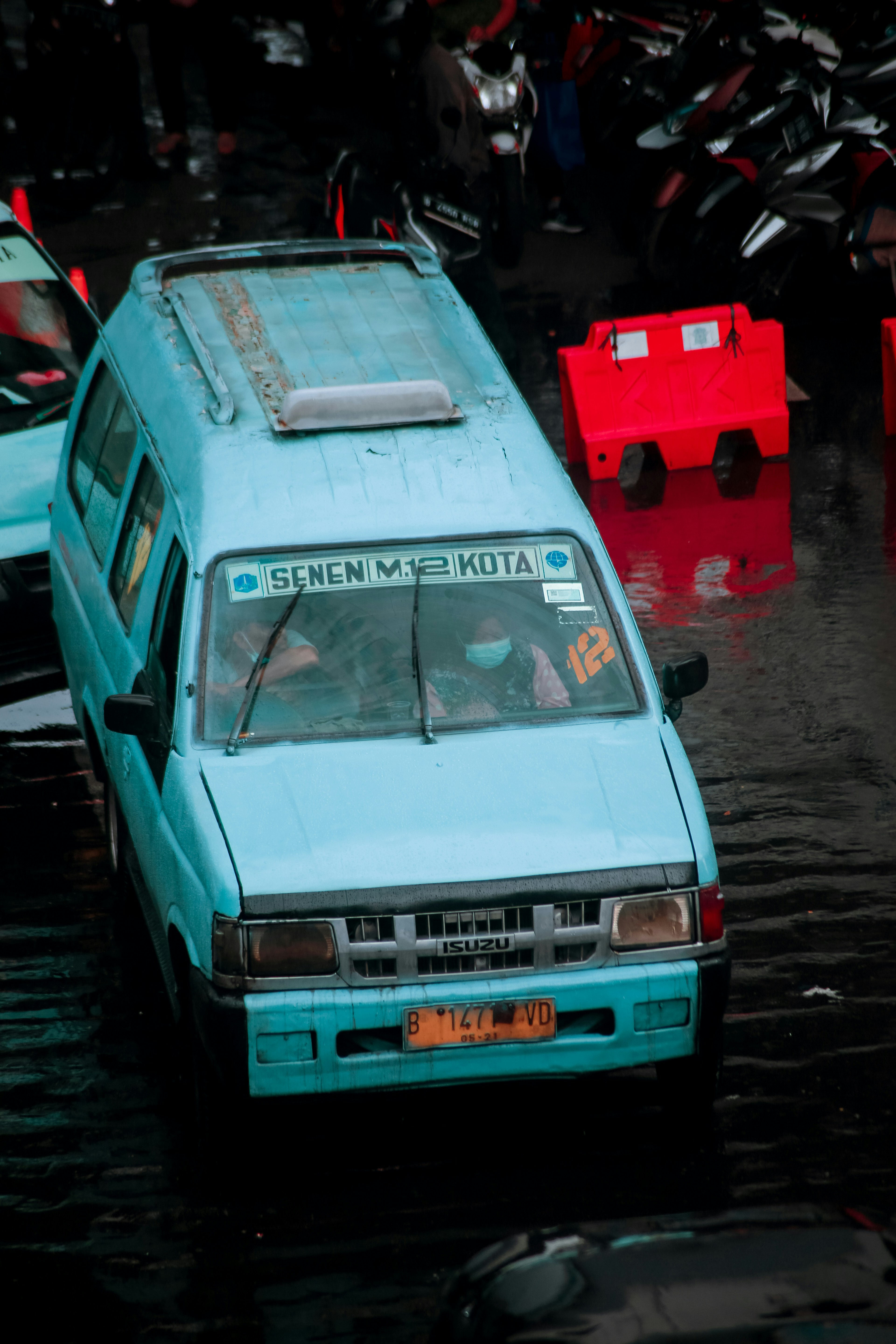 white car on wet road