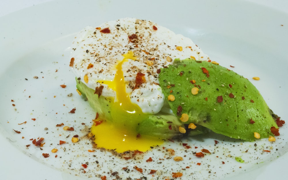 green and white vegetable salad on white ceramic plate