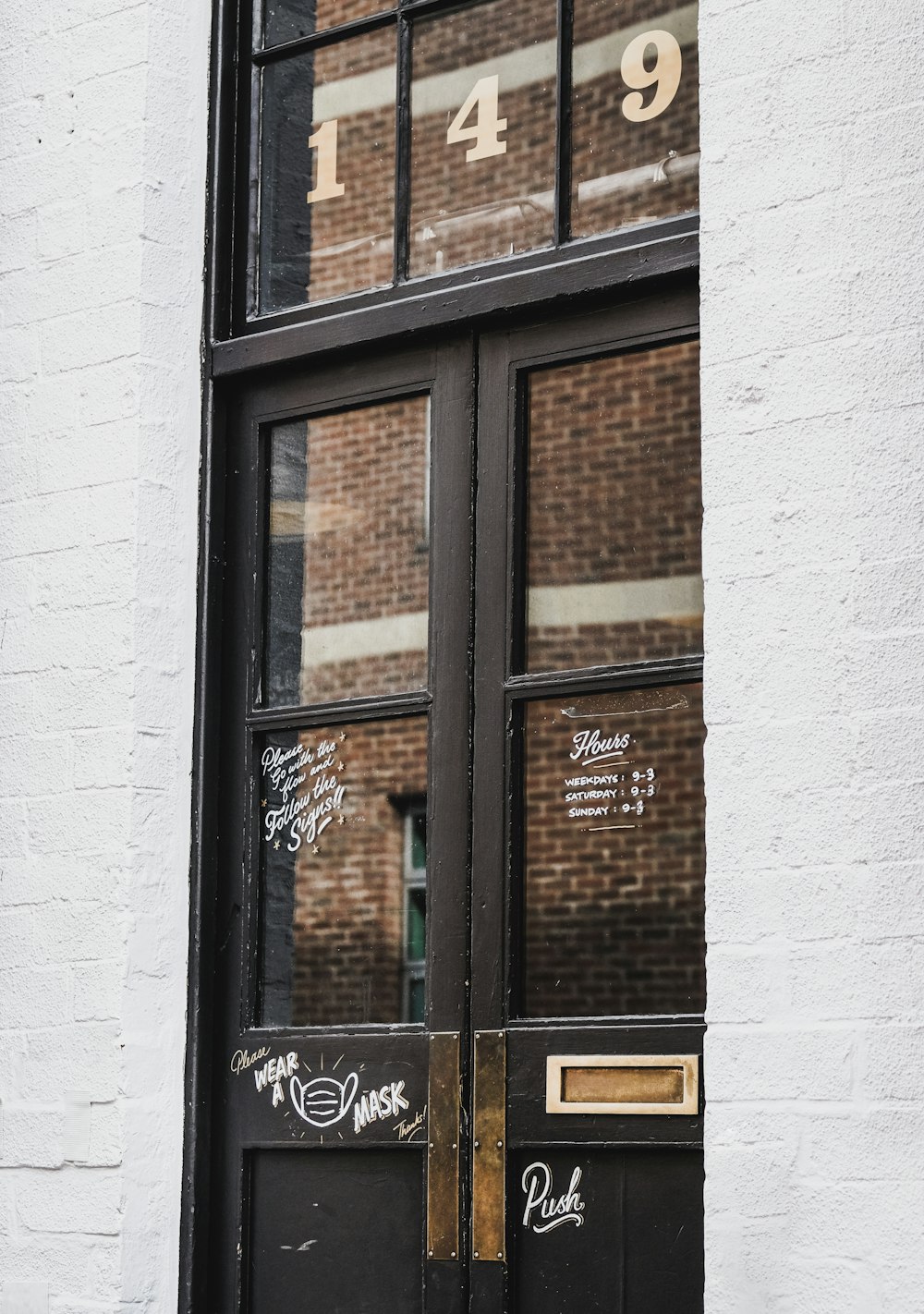 brown wooden framed glass window