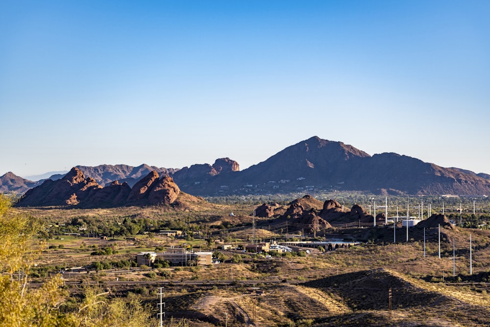 brown mountains under blue sky during daytime