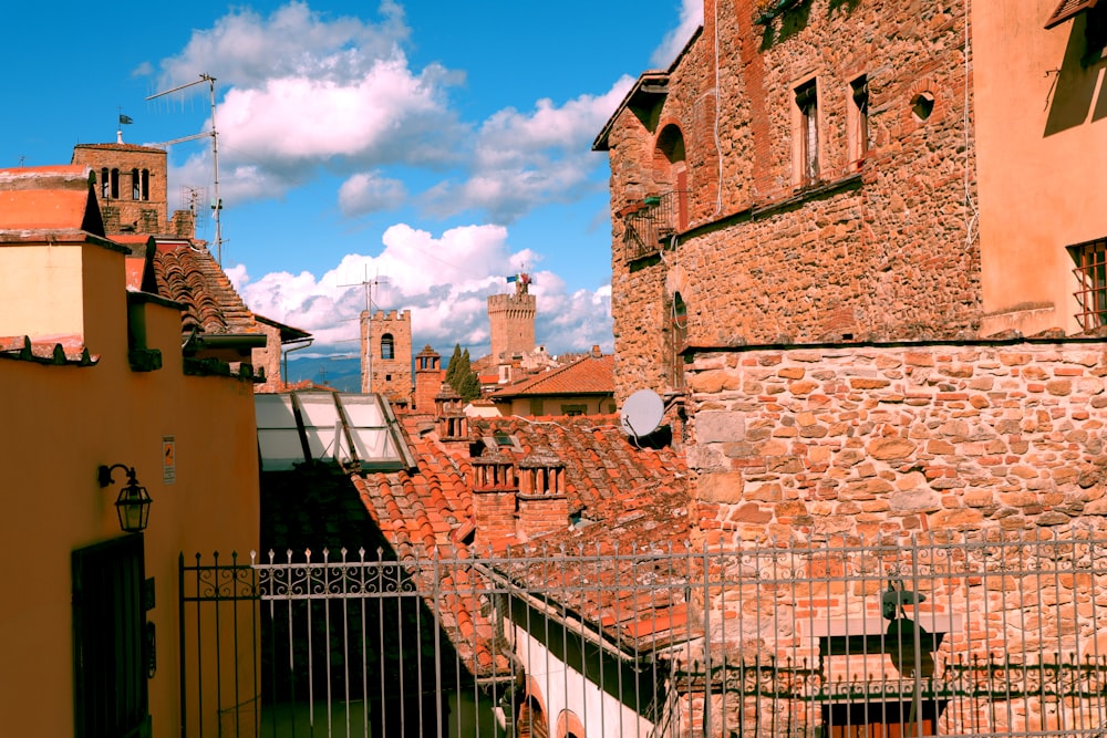 brown brick building under blue sky during daytime