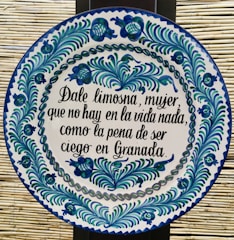 A detailed view of a traditional Spanish ceramic artifact.