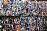 assorted clothes hanging on rack