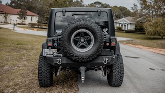 black off road car on road during daytime