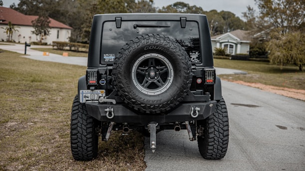 black off road car on road during daytime