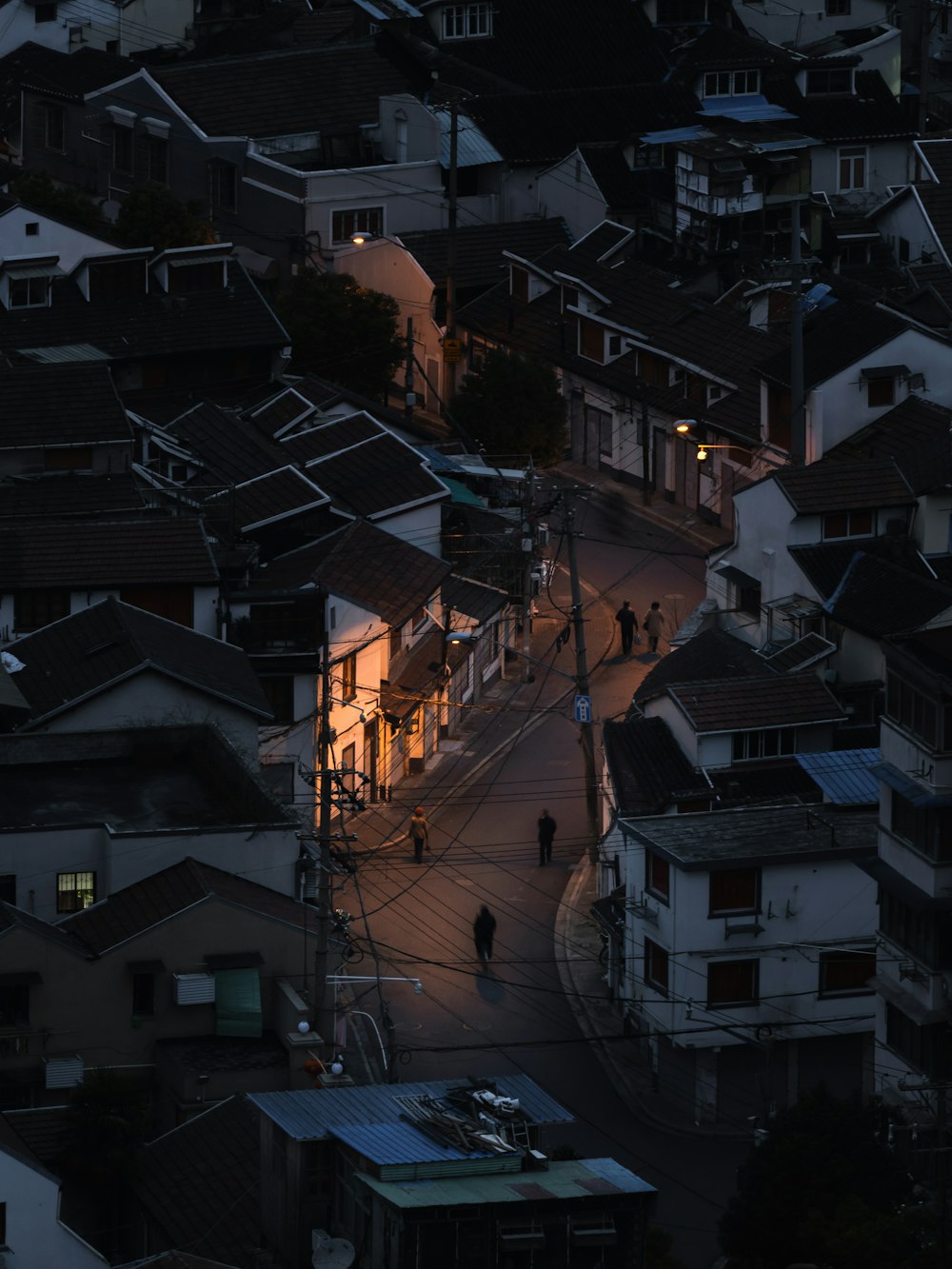 white and brown concrete houses during night time