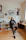 man in black jacket sitting on chair