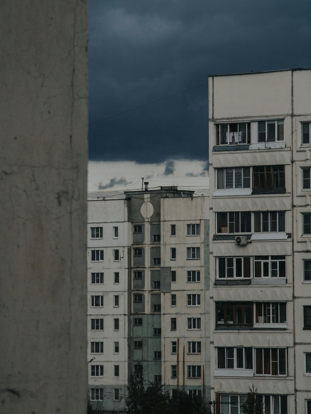 white concrete building under blue sky during daytime