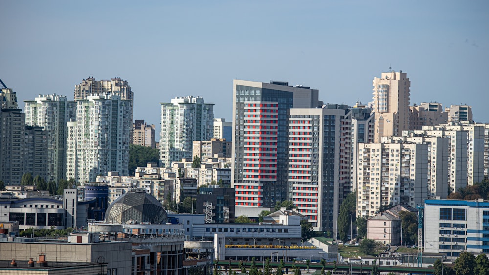 city buildings under blue sky during daytime