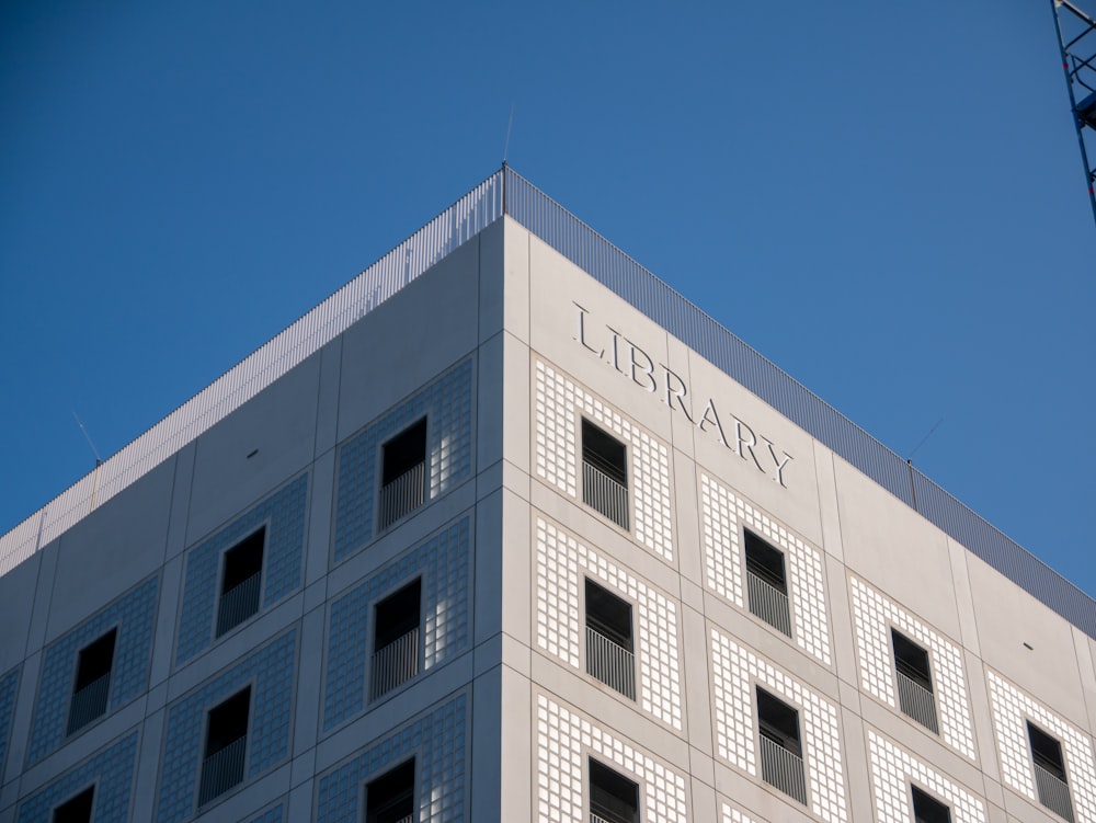 white concrete building under blue sky during daytime